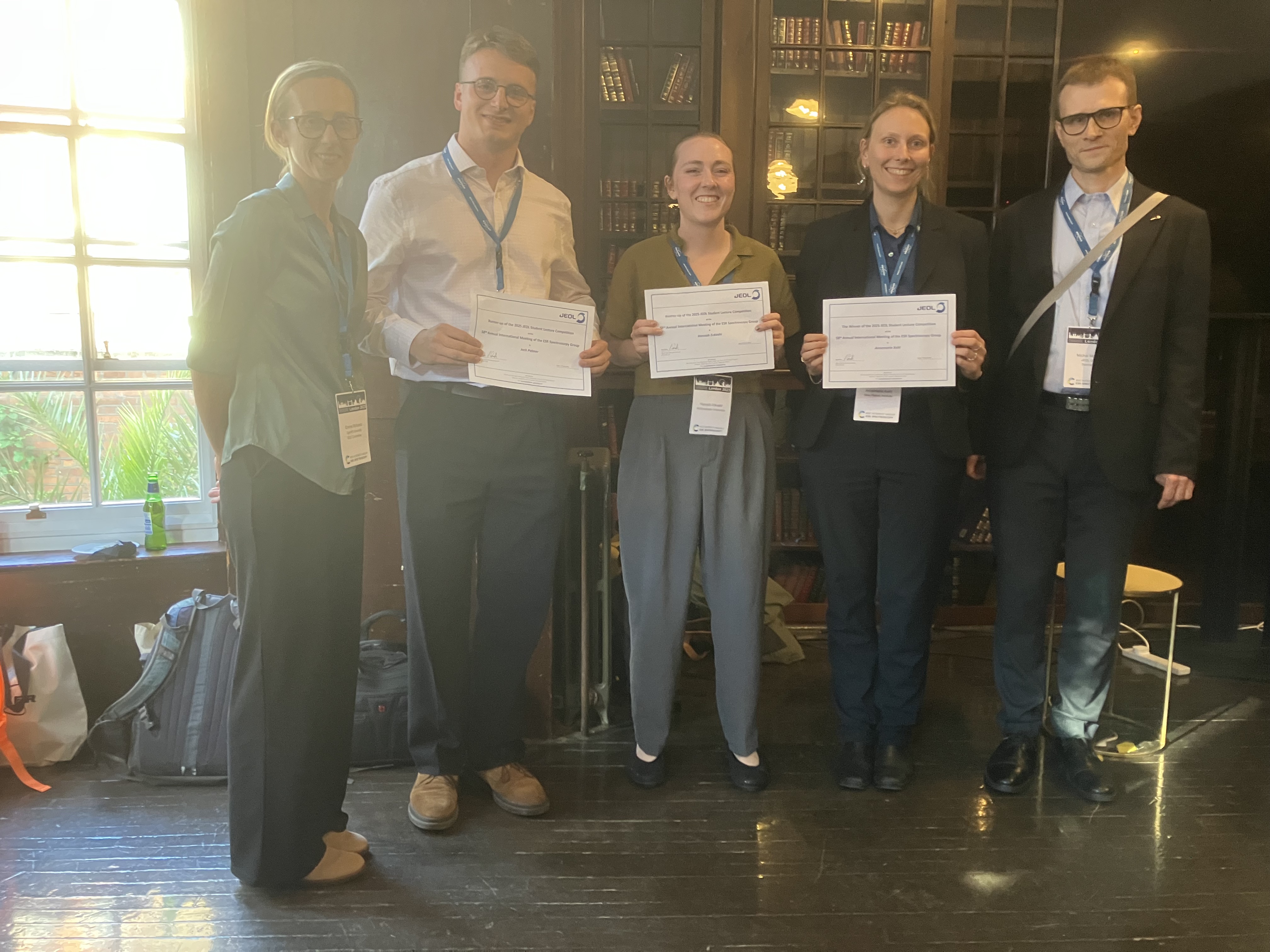 L to R: Emma Richards (ESR Group Chairman), Jack Palmer (runner-up), Hannah Eckvahl (runner-up), Annemarie Kehl(winner),Michal Malon (JEOL UK) JEOL prize runner-up 2025