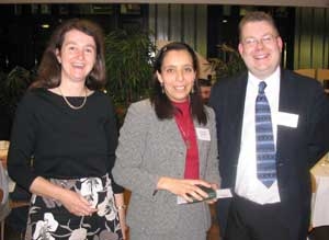 L to R Shirley Fairhurst (Chair), Malika Bouterfas (Winner 2005) and Richard Arnott (JEOL)